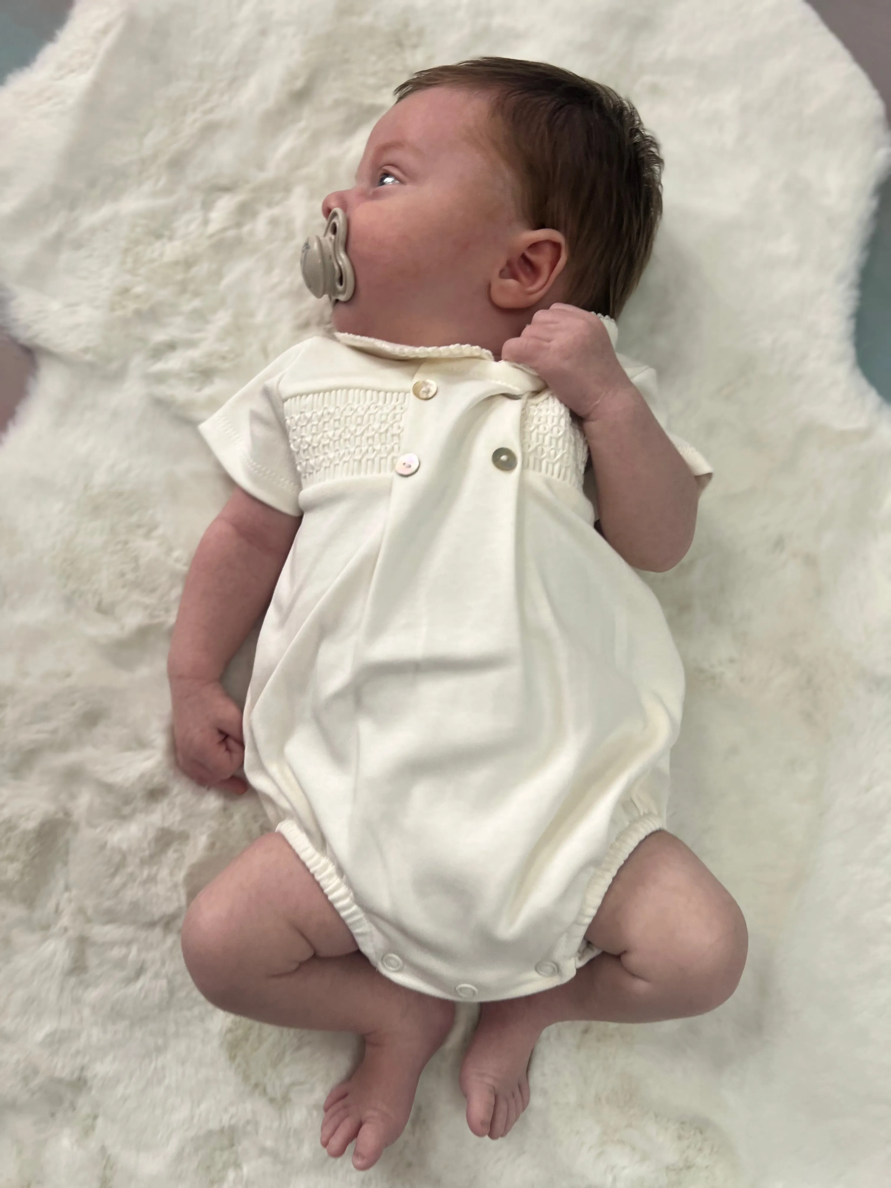 Unisex ivory smocked romper